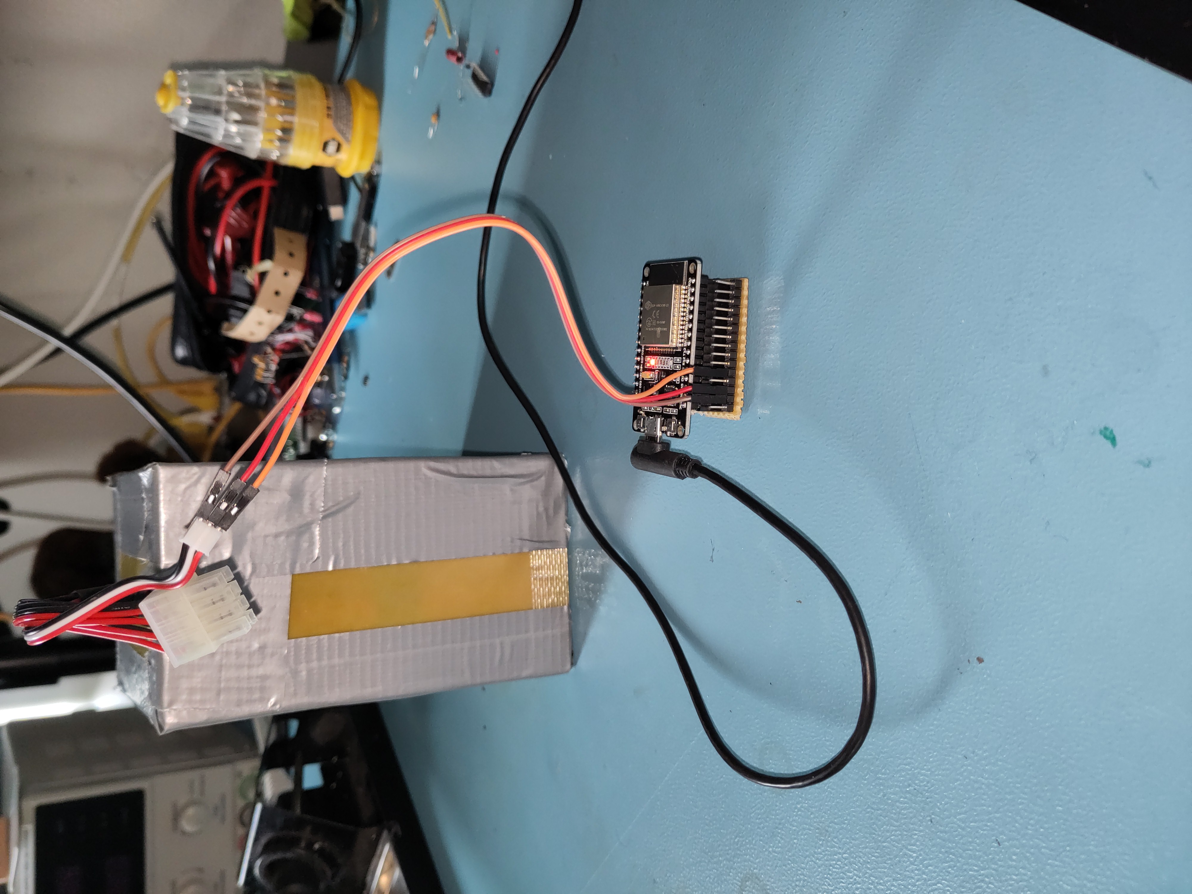 Picture of the battery connected to an ESP32 reading it out